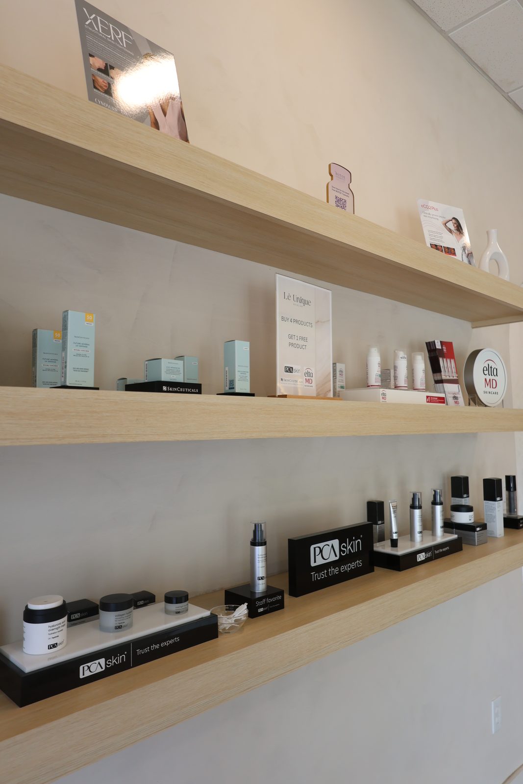 Skincare shelves in the Lè Unique Skinlab retail area